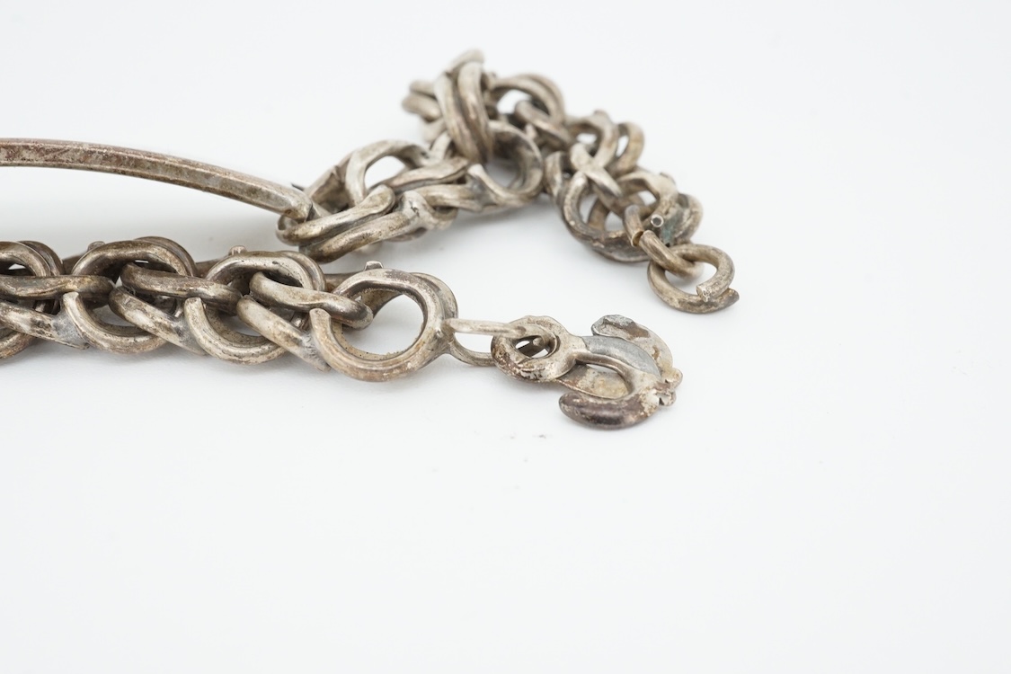 A 1970's silver identity bracelet and a modern pair of silver and two colour enamel cufflinks.